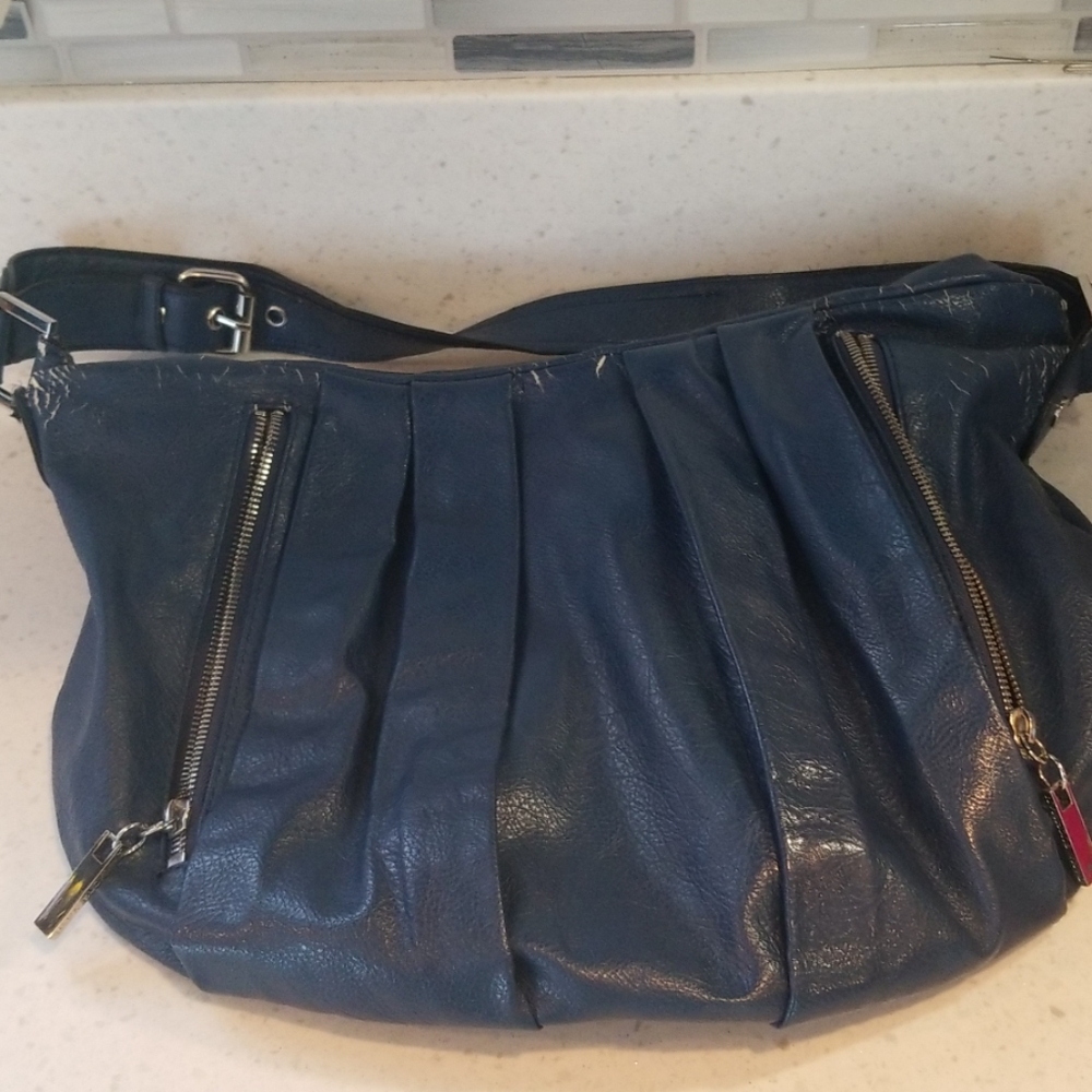 Used blue pleather purse
